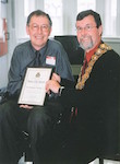Mayor Garry Moore presents Peace City Award to Dr Neil Cherry